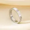 Rueda de Cartas Moda Femenina Tornillo 6 Diamantes Redondo Anillo de Pareja Moda Dongguan Joyería de Acero de Titanio