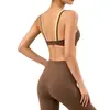 Nuevo traje deportivo bicolor para mujer, a prueba de impactos, de soporte, transpirable, sujetador deportivo y shorts de yoga de dos piezas falsos