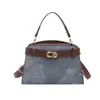 Bolso de mujer de alta gama de nicho, bolso de hombro cruzado de moda vintage de verano 2025, bolso de mano popular de lujo ligero