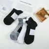 Calcetines de rizo calcetines cortos para hombre calcetines invisibles transpirables calcetines deportivos profesionales para correr de corte bajo para otoño e invierno calcetines de hombre de moda