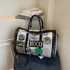 Bolsa de Viagem Curta 2026 Nova Moda Outono e Inverno Bolsa de Fitness de Grande Capacidade Bolsa de Bagagem Casual para Homens e Mulheres