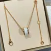 Colar Baojia Cintura Fina Versão Alta V Dourado Novo Modelo Pessoas Vermelhinhas Edição Beneficente Cerâmica Preto e Branco Grande Prata Espessa Banhada 18K Atacado