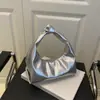 Verano 2025 Nuevo Versátil Moderno Estilo Ins Bolso Dumpling Textura de Cuero Suave Bolso de Mano Diseño Nicho Bolso de Mujer