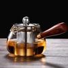 Juego de té de Kung Fu con asa lateral gruesa, taza de té pública de vidrio de silicona Gaopeng, juego de té resistente al calor con filtro de mar para té.