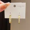 Aretes Geométricos Redondos de Oro Real de 14K Electrochapado Lujo Ligero Circonita Retro Simples de Moda para Viajero Pendientes de Gama Alta para Mujeres