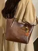 Yue Zi 2026 Outono Inicial Nova Casual Simples Grande Capacidade Para o Trabalho Moda de Alto Padrão Bolsa Tote de Ombro Único ou de Mão