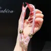 Pulsera de Muñeca de Color Caramelo de Moda Pulsera Corta de Perlas Redondas con Diamantes Venta Caliente Transfronteriza Correa de Mano Antiperdida y Anticaída Estilo Caliente