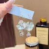 Anfitriã de Jantar~Brincos Argola Flor Dourada Femininos Leve Luxo Alto Padrão Exquisitos Brincos 2026 Novos Deslumbrantes Acessórios de Brincos