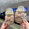 Zapatillas infantiles de dibujos animados lindas para Amazon transfronterizas zapatos con agujeros de EVA verano para casa antideslizantes desodorantes zapatos con agujeros para niños