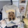 Venda por atacado urso preto estampado manga curta camiseta feminina 2023 verão novo coreano americano estilo loose top ins na moda