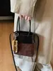 Bolso Retro de Ante Transfronterizo para Mujer 2026 Nuevo Bolso Cruzado de Nicho Moda de Alta Gama Patchwork Bolso Cubo de Moda