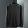 Camiseta de manga larga de otoño, capa base talla grande, cuello redondo para hombre, top simple y holgado, estilo coreano, camiseta estampada de moda
