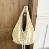 Bolsa estampada de estilo casual transfronteiriço para mulheres, nova bolsa de ombro de grande capacidade outono 2026, bolsa tote estudantil moderna e versátil