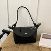 Comercio exterior transfronterizo, tejido minimalista para mujer, nueva colección otoño 2026, bolso de hombro estilo coreano para el día a día, bolso de hombro exquisito con forma de empanadilla
