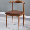 Juego de mesa y sillas de comedor estilo industrial retro para uso doméstico, mesa de comedor rectangular, silla de arte de hierro con cuernos para comedor
