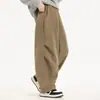 Pantalones de otoño para niños 2026 nuevos pantalones holgados de pierna ancha para niños, pantalones casuales de moda y versátiles para niños mayores, pantalones de pierna curva