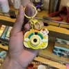 Llavero de Cámara de Proyección de Dibujos Animados Sanrio Colgante para Bolso Juguete para Niños Colgante Luminoso Pequeño Regalo Venta al por Mayor