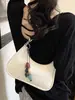 Bolso nuevo para mujer 2026, moderno y elegante, alto valor estético, bolso cuadrado pequeño, único y simple, color liso, bolso de hombro y cruzado, versión coreana