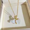 Nuevo collar de calabaza con piedra ojo de gato blanca estilo chino con diamantes microincrustados y lazo, cadena de clavícula versátil y de moda para mujer, venta al por mayor transfronteriza