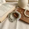 Diadema elástica plisada de satén suave estilo coreano con adornos de cristal, creando un look atmosférico, adecuada para coletas altas y moños