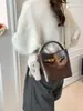 Bolso de Mano de Comercio Exterior Bolso Cubo para Mujer Moda Nueva Otoño e Invierno Bolso de Hombro para Viajes de Negocios Bolso Cruzado Retro de Alta Gama