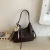 Bolsas de Grande Capacidade para Primavera e Verão para Mulheres 2026 Nova Moda Mochila de Trabalho com Múltiplos Usos Bolsa de Ombro Único Tipo Balde Tote Bag