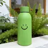 Nuevo vaso de agua con cara sonriente, carcasa exterior de plástico de doble capa de alta estética, vaso de cristal, regalo para evento de celebración de tienda promocional, venta al por mayor