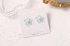 Pendientes de moda creativos personalizados con flores pequeñas para niña dulce, pendientes de flores multicolores de moda, pendientes simples y dulces al por mayor