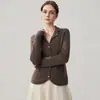 Nueva chaqueta casual de manga larga para otoño e invierno, versátil, de color liso para mujer, con botones, cuello de traje y tejido de cachemir