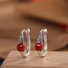 Aretes de carácter plata S925 plata esterlina chapados en oro con incrustaciones de ágata roja del sur estilo ins personalidad diseño de nicho aretes