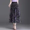 Falda de Línea A Estampada con Cintura Elástica 2026 Verano Nueva Moda Versátil Cubre Cadera Fluida Juvenil Tendencia de Falda Media