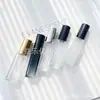 En stock suministro perfume sub-botella botella de muestra pequeña 10 ml botella de spray de vidrio botella vacía botella de repuesto cosmético