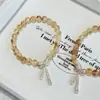 Pulsera de Hilo Elástico con Borla y Lazo de Cristal Amarillo Natural para Mujer, Exquisita, Dulce, de Nicho, Estilo Lujo Ligero