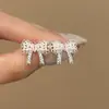 Novos brincos de pérola com laço cravejado de diamantes, luxo leve, brincos requintados de alta qualidade, acessórios de ouvido delicados da moda de nicho atacado
