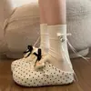 Populares zapatillas Birkenstock retro de slip-on con lazo y suela gruesa para mujer, nuevo modelo otoño 2026, zapatillas cerradas que aumentan la altura
