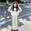Conjunto Deportivo de Otoño para Niñas 2026 Nueva Moda Elegante Sudadera Rayada para Niñas Grandes Conjunto de Dos Piezas para Niños de Otoño