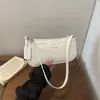 Bolso de un solo hombro para mujer en color liso, nuevo bolso de moda simple para señora mamá, bolso cruzado versátil de moda, lujo ligero transfronterizo