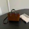 Bolso cubo retro para mujer 2026 nuevo bolso de mano de moda tipo cesta bolso de hombro de color liso bolso cruzado de alto valor