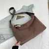 Bolsa de Ombro Única de Grande Capacidade para Axila Nova Chegada Outono 2026 Bolsa Transversal de Alto Valor Sensação Relaxada Cor Sólida Bolsa de Mão para o Trabalho