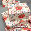 Una variedad de lindos papeles de regalo de dibujos animados para regalos navideños, materiales de embalaje para cajas de regalo, papel de regalo mixto de alta apariencia