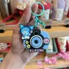 Llavero de Cámara de Proyección de Dibujos Animados Sanrio Colgante para Bolso Juguete para Niños Colgante Luminoso Pequeño Regalo Venta al por Mayor