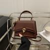 Bolsa Feminina Fresca e Simples 2025 Primavera/Verão Nova Bolsa Pequena Quadrada com Fecho Bolsa Transversal de Ombro Único Simples de Alto Nível Estilo Coreano