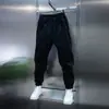 Calça jogger de moletom da moda estilo americano para homens, versátil, fashion, calça casual de corte justo