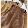 Falda de cintura alta estilo coreano, un popular nuevo artículo de moda para mujer para 2026, es extremadamente elegante y versátil