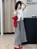 Conjunto de Duas Peças Verão 2026 Nova Moda Estilo Coreano Petite Emagrecedor Top Branco Sem Mangas e Calça de Perna Larga Xadrez