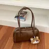 Almohada de comercio exterior transfronteriza 2026 simple casual retro europeo y americano nuevo bolso de mano de bolos debajo del brazo bolso de hombro baguette
