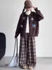 Colección de otoño para niñas: Conjunto de cárdigan de punto estilo coreano y pantalón de pierna ancha a cuadros nuevo 2026