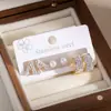Pendientes de Acero Inoxidable Transfronterizos Europeos y Americanos Más Vendidos para Mujer, Aros Dorados con Forma de Corazón Completamente Diamantados, Set de Tres Piezas de Pendientes de Moda Individualistas