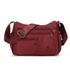 Mochila versátil para el día a día, popular en el sudeste asiático, bolso de hombro de moda para mujer, bolsa ligera de nailon resistente al agua