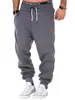 2023 nuevos pantalones deportivos de entrenamiento de costura para hombre de otoño e invierno, leggings, pantalones de fitness deportivos para hombre